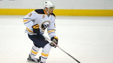 February 24, 2016; Anaheim, CA, USA; Buffalo Sabres left wing Evander Kane (9) moves the puck against Anaheim Ducks during the second period at Honda Center. Mandatory Credit: Gary A. Vasquez-USA TODAY Sports