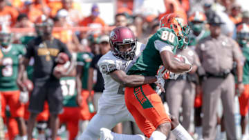 TALLAHASSEE, FL - OCTOBER 5: Defensive back Bryan Mills #22 of the North Carolina Central Eagles makes a tackle on wide receiver Marcus Williams #80 of the Florida A&M Rattlers after a catch during the game at Bragg Memorial Stadium Stadium on October 5, 2019 in Tallahassee, Florida. The Rattlers defeated the Eagles 28-21. (Photo by Don Juan Moore/Getty Images)