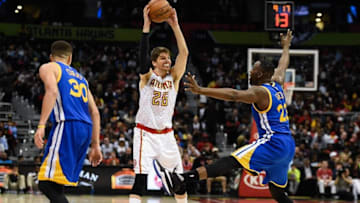 Feb 22, 2016; Atlanta, GA, USA; Atlanta Hawks guard Kyle Korver (26) is defended by Golden State Warriors forward Draymond Green (23) during the second half at Philips Arena. The Warriors defeated the Hawks 102-92. Mandatory Credit: Dale Zanine-USA TODAY Sports