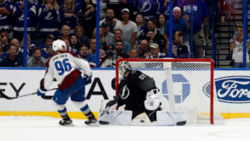 Oct 23, 2021; Tampa, Florida, USA; Colorado Avalanche right wing Mikko Rantanen (96) makes a goal against Tampa Bay Lightning goaltender Andrei Vasilevskiy (88) during a shoot out at Amalie Arena. Mandatory Credit: Kim Klement-USA TODAY Sports
