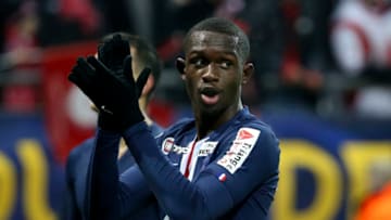 REIMS, FRANCE - JANUARY 22: Tanguy Kouassi of PSG celebrates the victory with the supporters following the French League Cup (Coupe de la Ligue) semifinal match between Stade de Reims and Paris Saint-Germain (PSG) at Stade Auguste Delaune on January 22, 2020 in Reims, France. (Photo by Jean Catuffe/Getty Images)