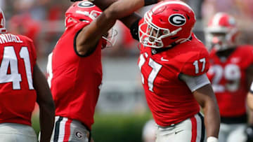 Georgia inside linebacker Nakobe Dean celebrates with Georgia outside linebacker Nolan Smith. (Photo by Joshua L Jones, Online Athens)