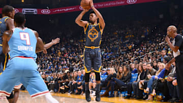 OAKLAND, CA - NOVEMBER 24: Quinn Cook #4 of the Golden State Warriors shoots the ball against the Sacramento Kings on November 24, 2018 at ORACLE Arena in Oakland, California. NOTE TO USER: User expressly acknowledges and agrees that, by downloading and/or using this photograph, user is consenting to the terms and conditions of Getty Images License Agreement. Mandatory Copyright Notice: Copyright 2018 NBAE (Photo by Noah Graham/NBAE via Getty Images)