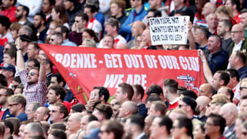 Arsenal fans hold up an anti-Stan Kroenke banner during the Premier League match at the Emirates Stadium, London. (Photo by Adam Davy/PA Images via Getty Images)