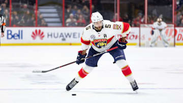 OTTAWA, ON - MARCH 28: Florida Panthers Defenceman Aaron Ekblad (5) prepares to shoot the puck during first period National Hockey League action between the Florida Panthers and Ottawa Senators on March 28, 2019, at Canadian Tire Centre in Ottawa, ON, Canada. (Photo by Richard A. Whittaker/Icon Sportswire via Getty Images)