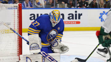 Nov 10, 2023; Buffalo, New York, USA; Buffalo Sabres goaltender Devon Levi (27) makes a save during the third period against the Minnesota Wild at KeyBank Center. Mandatory Credit: Timothy T. Ludwig-USA TODAY Sports