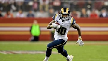 Sep 12, 2016; Santa Clara, CA, USA; Los Angeles Rams running back Todd Gurley (30) rushes against the San Francisco 49ers during the first half of an NFL game at Levi's Stadium. Mandatory Credit: Kirby Lee-USA TODAY Sports