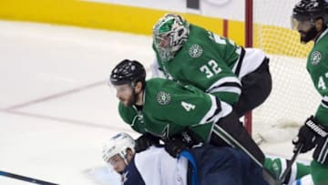 Jan 7, 2016; Dallas, TX, USA; Dallas Stars defenseman Jason Demers (4) and goalie Kari Lehtonen (32) defend against Winnipeg Jets center Andrew Copp (9) during the first period at the American Airlines Center. Mandatory Credit: Jerome Miron-USA TODAY Sports