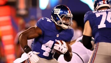 Aug 22, 2015; East Rutherford, NJ, USA; New York Giants running back Andre Williams (44) rushes the ball during the first half against the Jacksonville Jaguars at MetLife Stadium. Mandatory Credit: Danny Wild-USA TODAY Sports
