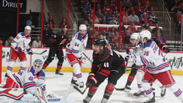 RALEIGH, NC - OCTOBER 07: Jordan Martinook #48 of the Carolina Hurricanes shoots and scores past the defense of Alexander Georgiev #40 of the New York Rangers during an NHL game on October 7, 2018 at PNC Arena in Raleigh, North Carolina. (Photo by Gregg Forwerck/NHLI via Getty Images)