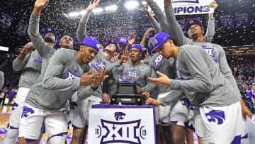 MANHATTAN, KS - MARCH 09: Players of the Kansas State Wildcats celebrate after wining the Big 12 Regular Season Championship on March 9, 2019 at Bramlage Coliseum in Manhattan, Kansas. (Photo by Peter G. Aiken/Getty Images)