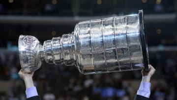 Jun 13, 2014; Los Angeles, CA, USA; The Stanley Cup is on the ice after the Los Angeles Kings defeated the New York Rangers in second overtime during game five of the 2014 Stanley Cup Final at Staples Center. Mandatory Credit: Gary Vasquez-USA TODAY Sports