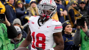 Nov. 25, 2023; Ann Arbor, Mi., USA;Ohio State Buckeyes wide receiver Marvin Harrison Jr. (18) scores a touchdown during the second half of Saturday's NCAA Division I football game against the University of Michigan.