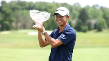DUBLIN, OHIO - JULY 12: Collin Morikawa of the United States celebrates with the winner's trophy after the final round of the Workday Charity Open on July 12, 2020 at Muirfield Village Golf Club in Dublin, Ohio. (Photo by Gregory Shamus/Getty Images)