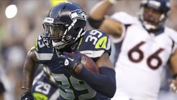 Aug 17, 2013; Seattle, WA, USA; Seattle Seahawks cornerback Brandon Browner (39) returns a fumble 106 yards for a touchdown against the Denver Broncos during the second quarter at CenturyLink Field. Mandatory Credit: Joe Nicholson-USA TODAY Sports