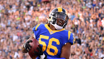 LOS ANGELES, CA - NOVEMBER 11: Dante Fowler #56 of the Los Angeles Rams celebrates his sack and fumble recovery in the fourth quarter during a 36-31 win over the Seattle Seahawks at Los Angeles Memorial Coliseum on November 11, 2018 in Los Angeles, California. (Photo by Harry How/Getty Images)