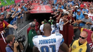Sep 22, 2013; Landover, MD, USA; Detroit Lions wide receiver Calvin Johnson (81) walks off the field after the game against the Washington Redskins at FedEx Field. The Lions won 27-20. Mandatory Credit: Geoff Burke-USA TODAY Sports