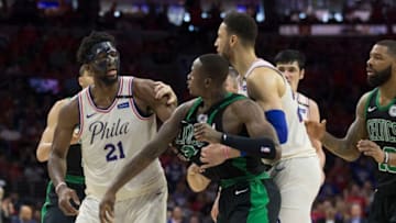 PHILADELPHIA, PA - MAY 7: Joel Embiid #21 of the Philadelphia 76ers gets into an altercation with Terry Rozier #12 of the Boston Celtics as Jayson Tatum #0 of the Boston Celtics and Ben Simmons #25 of the Philadelphia 76ers try to break them up in the second quarter during Game Four of the Eastern Conference Second Round of the 2018 NBA Playoffs at Wells Fargo Center on May 7, 2018 in Philadelphia, Pennsylvania. NOTE TO USER: User expressly acknowledges and agrees that, by downloading and or using this photograph, User is consenting to the terms and conditions of the Getty Images License Agreement. (Photo by Mitchell Leff/Getty Images)