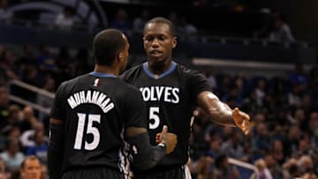 Nov 7, 2014; Orlando, FL, USA; Minnesota Timberwolves center Gorgui Dieng (5) and forward Shabazz Muhammad (15) talk against the Orlando Magic during the second quarter at Amway Center. Mandatory Credit: Kim Klement-USA TODAY Sports