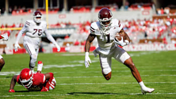 FAYETTEVILLE, ARKANSAS - OCTOBER 21: Zavion Thomas #1 of the Mississippi State Bulldogs runs the ball to the one yard line against Jaheim Thomas #28 of the Arkansas Razorbacks at Donald W. Reynolds Razorback Stadium on October 21, 2023 in Fayetteville, Arkansas. The Bulldogs defeated the Razorbacks 7-3. (Photo by Wesley Hitt/Getty Images)