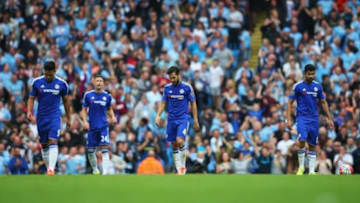 MANCHESTER, ENGLAND - AUGUST 16: Cesc Fabregas (C) of Chelsea looks dejected with team mates after the third Manchester City goal scored by Fernandinho of Manchester City during the Barclays Premier League match between Manchester City and Chelsea at the Etihad Stadium on August 16, 2015 in Manchester, England. (Photo by Alex Livesey/Getty Images)