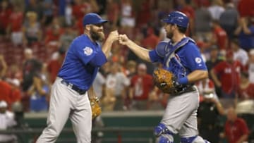Jul 22, 2015; Cincinnati, OH, USA; Chicago Cubs relief pitcher Jason Motte (L) celebrates with catcher Taylor Teagarden (R) after defeating the Chicago Cubs 6-5 at Great American Ball Park. Mandatory Credit: David Kohl-USA TODAY Sports