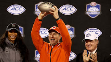 CHARLOTTE, NC - DECEMBER 01: Head coach Dabo Swinney of the Clemson Tigers holds the ACC Championship trophy after their 42-10 victory over the Pittsburgh Panthers at Bank of America Stadium on December 1, 2018 in Charlotte, North Carolina. (Photo by Streeter Lecka/Getty Images)