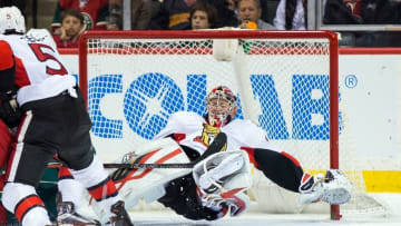 Mar 31, 2016; Saint Paul, MN, USA; Ottawa Senators goalie Craig Anderson (41) falls to make a save in the third period against the Minnesota Wild at Xcel Energy Center. the Ottawa Senators beat the Minnesota Wild 3-2. Mandatory Credit: Brad Rempel-USA TODAY Sports