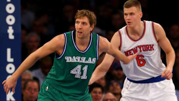 NEW YORK, NY - DECEMBER 07: Dirk Nowitzki #41 of the Dallas Mavericks and Kristaps Porzingis #6 of the New York Knicks fight for position at Madison Square Garden on December 7, 2015 in New York City. NOTE TO USER: User expressly acknowledges and agrees that, by downloading and/or using this Photograph, user is consenting to the terms and conditions of the Getty Images License Agreement. (Photo by Elsa/Getty Images)
