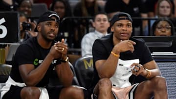 OKC Thunder: Chris Paul #3 and Russell Westbrook #0 attend a game (Photo by David Becker/NBAE via Getty Images)