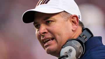 FAYETTEVILLE, AR - OCTOBER 31: Head Coach Jason Simpson of the UT Martin Skyhawks talks to a official during a game against the Arkansas Razorbacks at Razorback Stadium on October 31, 2015 in Fayetteville, Arkansas. The Razorbacks defeated the Skyhawks 63-28. (Photo by Wesley Hitt/Getty Images)
