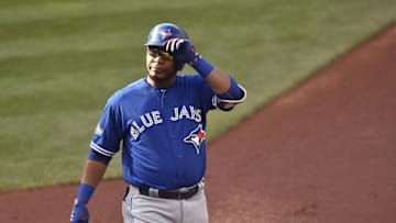 Oct 15, 2016; Cleveland, OH, USA; Toronto Blue Jays first baseman Edwin Encarnacion (10) reacts after grounding out against the Cleveland Indians during the first inning of game two of the 2016 ALCS playoff baseball series at Progressive Field. Mandatory Credit: David Richard-USA TODAY Sports
