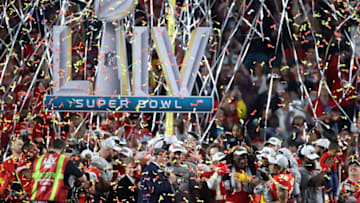 MIAMI, FLORIDA - FEBRUARY 02: The Kansas City Chiefs celebrate with the Vince Lombardi Trophy after defeating the San Francisco 49ers 31-20 in Super Bowl LIV at Hard Rock Stadium on February 02, 2020 in Miami, Florida. (Photo by Al Bello/Getty Images)