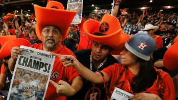 HOUSTON, TX - NOVEMBER 01: Houston fans celebrate after the Houston Astros defeated the Los Angeles Dodgers in Game 7 of the World Series during a Houston Astros World Series watch party at Minute Maid Park on November 1, 2017 in Houston, Texas. (Photo by Bob Levey/Getty Images)
