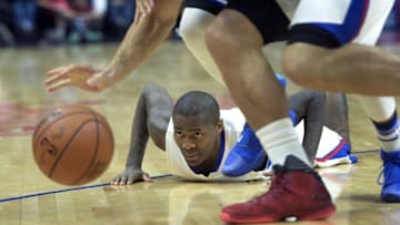 Apr 10, 2016; Los Angeles, CA, USA; Los Angeles Clippers guard Jamal Crawford (11) eyes the ball as it is recovered by forward Blake Griffin (32) during the second half against the Dallas Mavericks at Staples Center. Mandatory Credit: Robert Hanashiro-USA TODAY Sports