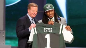 May 8, 2014; New York, NY, USA; Calvin Pryor (Louisville) poses for a photo with commissioner Roger Goodell after being selected as the number eighteen overall pick in the first round of the 2014 NFL Draft to the New York Jets at Radio City Music Hall. Mandatory Credit: Brad Penner-USA TODAY Sports