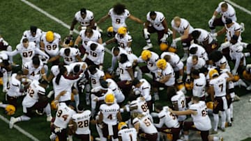 SEATTLE, WA - NOVEMBER 19: Members of the Arizona State Sun Devils kneel together prior to the game against the Washington Huskies on November 19, 2016 at Husky Stadium in Seattle, Washington. (Photo by Otto Greule Jr/Getty Images)