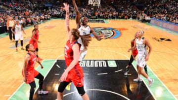 NEW YORK,NY - SEPTEMBER 18: Tina Charles #31 of the New York Liberty goes up for the layup against the Washington Mystics during game One of the WNBA Semi-Finals at Madison Square Garden on September 18, 2015 in New York, New York NOTE TO USER: User expressly acknowledges and agrees that, by downloading and/or using this Photograph, user is consenting to the terms and conditions of the Getty Images License Agreement. Mandatory Copyright Notice: Copyright 2015 NBAE (Photo by Jesse D. Garrabrant/NBAE via Getty Images)