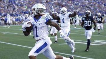 ORLANDO, FL - JANUARY 01: Lynn Bowden Jr. #1 of the Kentucky Wildcats returns a punt 56 yards for a touchdown against the Penn State Nittany Lions in the first quarter of the VRBO Citrus Bowl at Camping World Stadium on January 1, 2019 in Orlando, Florida. (Photo by Joe Robbins/Getty Images)