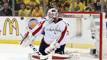 May 4, 2016; Pittsburgh, PA, USA; Washington Capitals goalie Braden Holtby (70) makes a save against the Pittsburgh Penguins during the first period in game four of the second round of the 2016 Stanley Cup Playoffs at the CONSOL Energy Center. The Penguins won 3-2 in overtime to take a 3-1 lead in the series. Mandatory Credit: Charles LeClaire-USA TODAY Sports