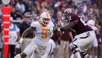 Oct 8, 2016; College Station, TX, USA; Tennessee Volunteers defensive end Derek Barnett (9) and Texas A&M Aggies offensive lineman Avery Gennesy (65) in action during the game at Kyle Field. The Aggies defeat the Volunteers 45-38 in overtime. Mandatory Credit: Jerome Miron-USA TODAY Sports