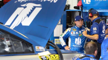 Jul 29, 2016; Long Pond, PA, USA; NASCAR Sprint Cup Series driver Jeff Gordon (left) talks to crew chief Greg Ives (right) during practice for the Pennsylvania 400 at Pocono Raceway. Mandatory Credit: Matthew O