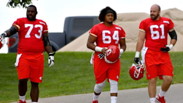 Jul 30, 2016; St. Joseph, MO, USA; Kansas City Chiefs guard Zach Fulton (73), center Daniel Munyer (64) and center Mitch Morse (61) walk to the field before the start of Kansas City Chiefs training camp presented by Mosaic Life Care at Missouri Western State University. Mandatory Credit: Denny Medley-USA TODAY Sports