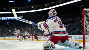 COLUMBUS, OHIO - APRIL 08: Igor Shesterkin #31 of the New York Rangers swats the puck out of the air with his stick during the second period against the Columbus Blue Jackets at Nationwide Arena on April 08, 2023 in Columbus, Ohio. (Photo by Jason Mowry/Getty Images)