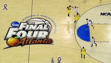 Apr 8, 2013; Atlanta, GA, USA; A general view of the floor as Michigan Wolverines guard Trey Burke (3) shoots and Louisville Cardinals guard Peyton Siva (3) defends during the second half of the championship game in the 2013 NCAA mens Final Four at the Georgia Dome. Mandatory Credit: Bob Donnan-USA TODAY Sports