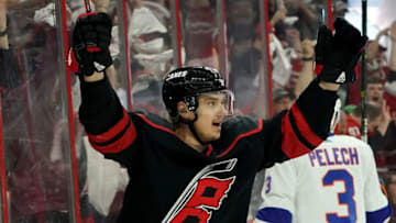 RALEIGH, NC - MAY 03: Sebastian Aho #20 of the Carolina Hurricanes celebrates after scoring a goal in Game Four of the Eastern Conference Second Round against the New York Islanders during the 2019 NHL Stanley Cup Playoffs on May 3, 2019 at PNC Arena in Raleigh, North Carolina. (Photo by Gregg Forwerck/NHLI via Getty Images)