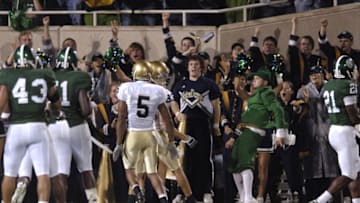 Notre Dame fans celebrate the touchdown of wide receiver Jeff Samardzija during the game between the Michigan State Spartans and the Notre Dame Fighting Irish at Spartan Stadium in East Lansing, Michigan on Saturday, September 23, 2006. (Photo by S. Levin/Getty Images)
