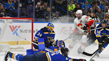 ST. LOUIS, MO - OCTOBER 25: St. Louis Blues goalie Jake Allen (34) blocks a shot on goal as St. Louis Blues defenseman Robert Bortuzzo (41) goes down during a National Hockey League game between the Calgary Flames and the St. Louis Blues on October 25, 2017, at Scottrade Center, St. Louis, MO. (Photo by Keith Gillett/Icon Sportswire via Getty Images)