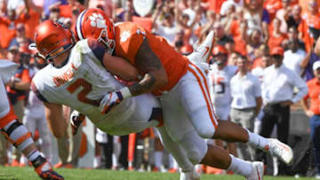 Clemson defensive lineman Xavier Thomas (3) sacks Syracuse quarterback Eric Dungey(2) during the fourth quarter in Memorial Stadium on Saturday, September 29, 2018.Syracuse At Clemson Football