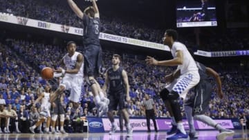 Jan 23, 2016; Lexington, KY, USA; Kentucky Wildcats guard Tyler Ulis (3) passes the ball against Vanderbilt Commodores forward Luke Kornet (3) in the second half at Rupp Arena. Kentucky defeated Vanderbilt 76-55. Mandatory Credit: Mark Zerof-USA TODAY Sports
